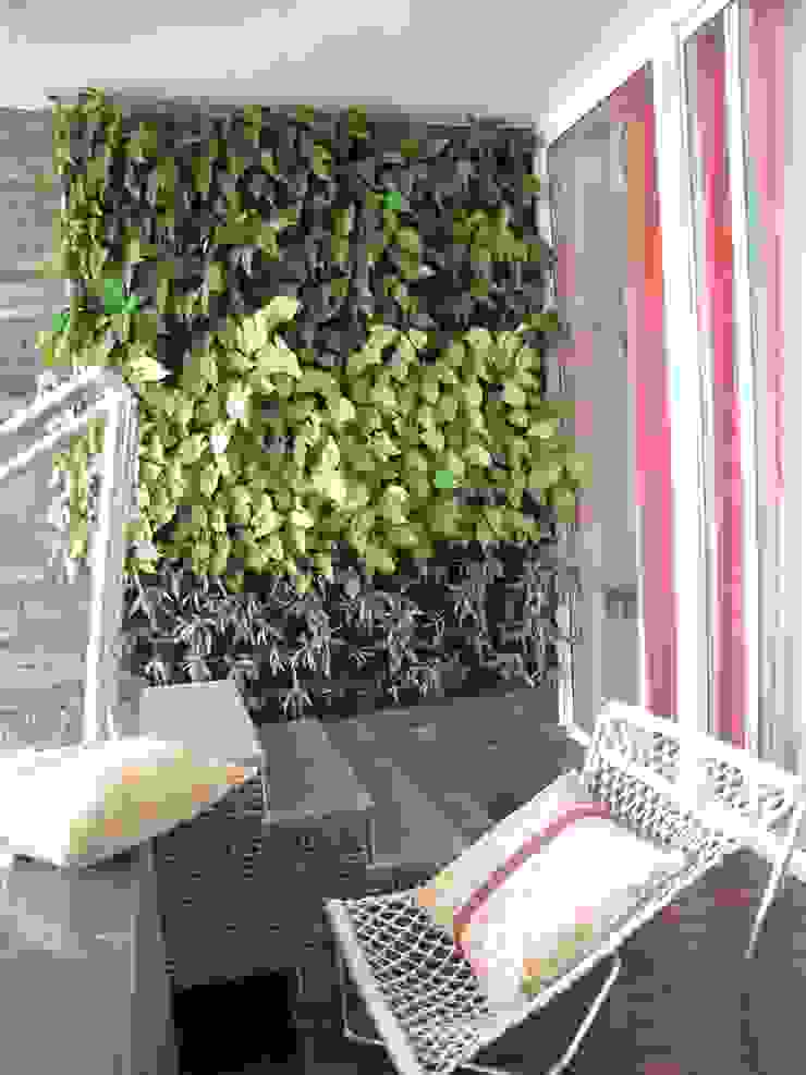 Intriguing Ikats, TUNI Interiors Pvt. Ltd. TUNI Interiors Pvt. Ltd. Asian style balcony, veranda & terrace Plant,Property,Houseplant,Window,Wood,Grass,Rectangle,Outdoor furniture,Shade,Curtain