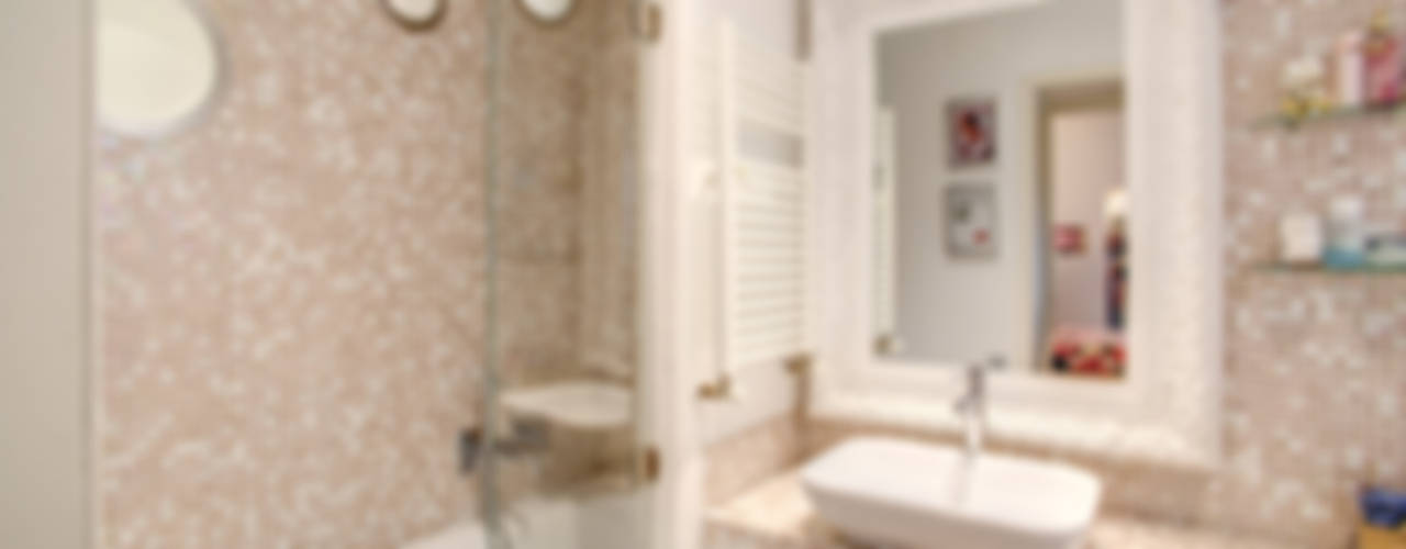 COVIELLO: I dettagli di design arricchiscono lo spazio del soggiorno, MOB ARCHITECTS MOB ARCHITECTS Modern style bathrooms