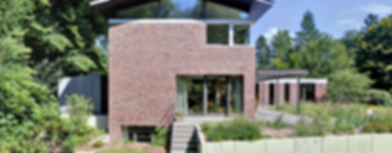Einfamilienhaus mit schwebendem Dach und Veranda in Bremen, Möhring Architekten Möhring Architekten Rumah Modern