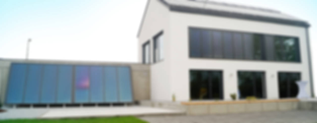 Energieeffizienzhaus Plus in Deggendorf, Karl Bachl GmbH & Co. KG Karl Bachl GmbH & Co. KG Modern Living Room