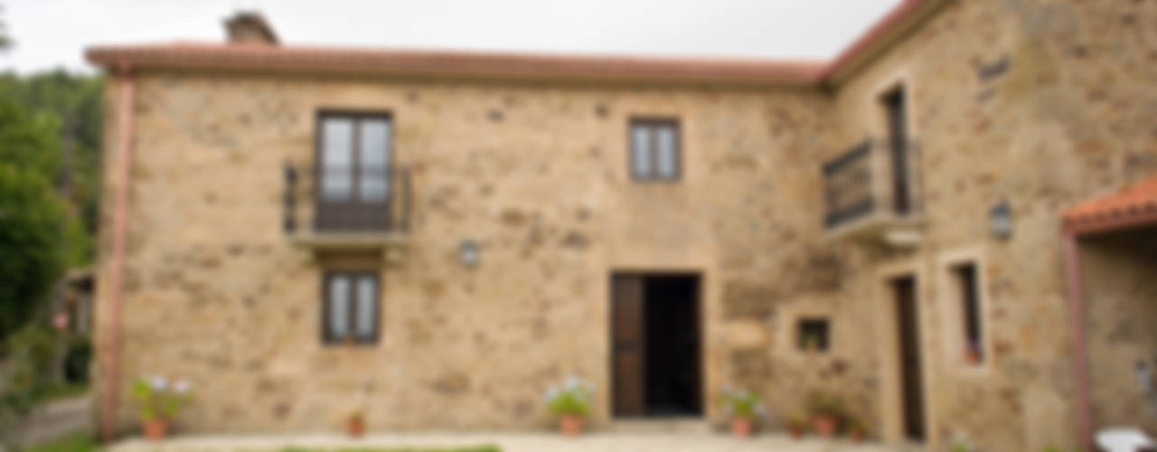 Rehabilitación en Laracha, Intra Arquitectos Intra Arquitectos Casas de estilo rural
