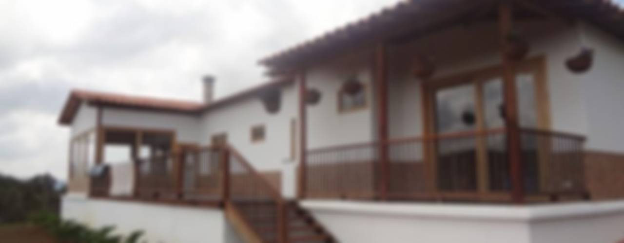Casa Prefabricada en Bogota, PREFABRICASA PREFABRICASA Case in stile rustico