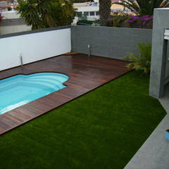 Césped Artificial: Jardines de estilo  de Ceramistas s.a.u., Rural  