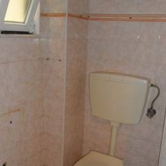 Instalação Sanitária: Antes por BL Design Arquitectura e Interiores Mediterrânico