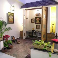 pooja room Ansari Architects Modern dining room Plant,Picture frame,Property,Houseplant,Building,Flowerpot,Green,Lighting,Interior design,Yellow