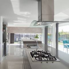 Casa M: Cocinas de estilo  por DMS Arquitectura