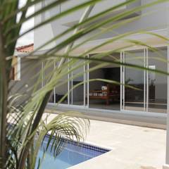 Casa LJ , Lozí - Projeto e Obra Lozí - Projeto e Obra Piscinas tropicais