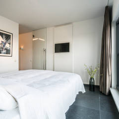 Lucht, Licht, Zicht:  Slaapkamer door Masters of Interior Design