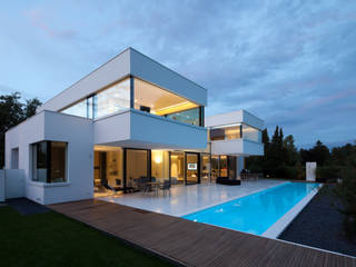 Casas modernas por HI-MACS® Moderno
