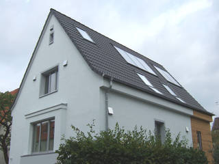 Siedlungshaus mit Holzscheibe, zymara und loitzenbauer architekten bda zymara und loitzenbauer architekten bda Maisons modernes