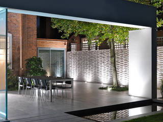 A Stunning and Spacious House Project in Wimbledon, Gregory Phillips Architects Gregory Phillips Architects حیاط