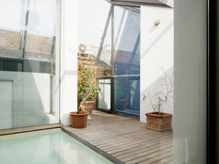 loft n° 5, roberto murgia architetto roberto murgia architetto Industrial style balcony, veranda & terrace