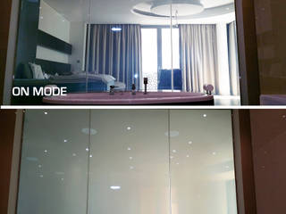 Residencia privada en "Emirates Hills", Vidrios de privacidad Vidrios de privacidad Baños de estilo ecléctico