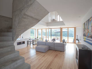 MAISON PASSIVE - ARCANGUES - PAYS BASQUE, POLY RYTHMIC ARCHITECTURE POLY RYTHMIC ARCHITECTURE Moderne woonkamers