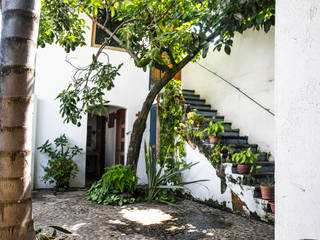 Casa de descanso en Chapala, Mikkael Kreis Architects Mikkael Kreis Architects สวน