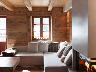 UN CALDO CHALET DI DESIGN , archstudiodesign archstudiodesign Salones escandinavos