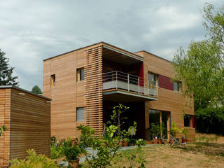 Un cube en bois, Tangentes Architectes Tangentes Architectes Maisons modernes