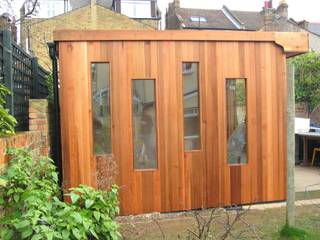 garden office, in and out design in and out design مكتب عمل أو دراسة