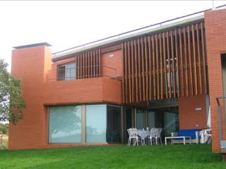 Vivienda Unifamiliar La Encomienda, UA30 Arquitectos S.L.P. UA30 Arquitectos S.L.P. منازل