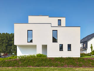 Einfamilienhaus in Niedrigenergiebauweise, Bruck + Weckerle Architekten Bruck + Weckerle Architekten Casas de estilo moderno