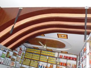 Wooden Films on Plaster of Paris Ceiling with Designer Effect, Floor2Walls Floor2Walls Ruang Komersial