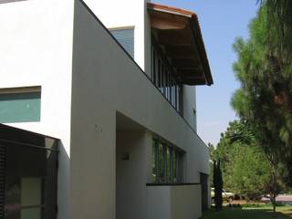 Casa en Villa Coral, 2003, Taller Luis Esquinca Taller Luis Esquinca Дома в стиле модерн
