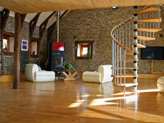 Barn in Chenailler Mascheix, France , Capra Architects Capra Architects Rustic style living room Fireplaces & accessories