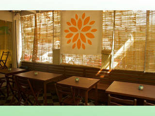 Yellow Tree Cafe at Lokhandwala, Design Kkarma (India) Design Kkarma (India) Ruang Komersial