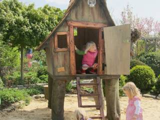 Märchenhaftes Spielhaus für die Kinder , Steffen GmbH Steffen GmbH Rustic style garden