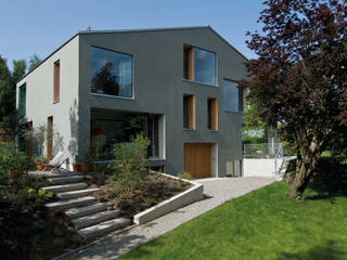 Zwei Wohnkulturen unter einem Dach, Halle 58 Architekten Halle 58 Architekten Modern houses