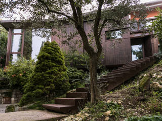 CASA RICCARDO "una lanterna tra i cipressi", Orlando Lanza Architetto Orlando Lanza Architetto Houses