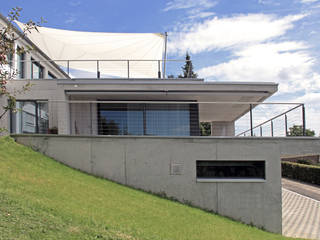 Anbau einer Einliegerwohnung, Schweizer Architekten HTl/STV Schweizer Architekten HTl/STV Varandas, alpendres e terraços modernos