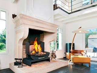 L'insert-ouvert dans une demeure en Ile de France, Finoptim Finoptim Classic style living room Fireplaces & accessories