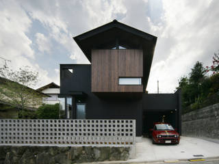 生駒のgarage house, 田中一郎建築事務所 田中一郎建築事務所 Houses