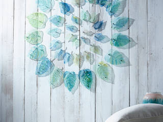 Swirling Leaves: Individually crafted fused-glass leaves mounted on custom made chrome wall fittings, Jo Downs Jo Downs