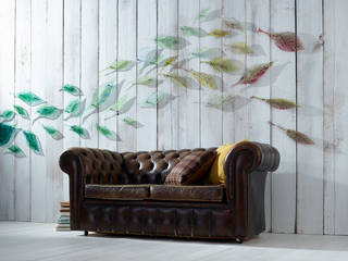 Swirling Leaves: Individually crafted fused-glass leaves mounted on custom made chrome wall fittings, Jo Downs Jo Downs