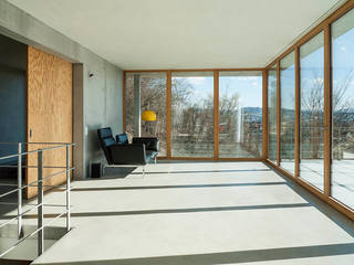 Modernes Traumhaus mit 1a-Aussicht, GIAN SALIS ARCHITEKT GIAN SALIS ARCHITEKT Salon moderne