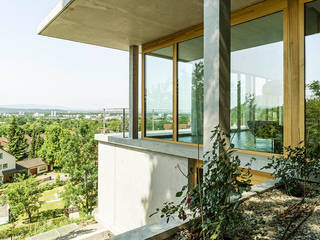 Modernes Traumhaus mit 1a-Aussicht, GIAN SALIS ARCHITEKT GIAN SALIS ARCHITEKT Сад