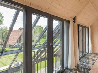 Duurzame Schuurwoning, schipperdouwesarchitectuur schipperdouwesarchitectuur Espaços