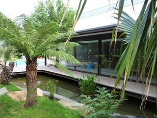 création d'une piscine et son Poolhouse., Christian Larroque Christian Larroque Piscinas modernas