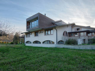 L'attinia e il paguro, una casa di legno sul tetto., Daniele Menichini Architetti Daniele Menichini Architetti Case moderne