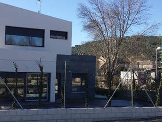 Casa con Energía Renovable Construida en 5 meses , AUNA ARQUITECTOS, S.L. AUNA ARQUITECTOS, S.L. Houses