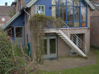 antroposofisch getint woonhuis, mickers architectuur mickers architectuur Casas de estilo rústico