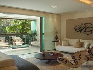 Apartamento Jardim Oceânico, Cadore Arquitetura Cadore Arquitetura Modern living room
