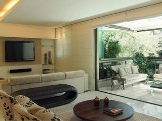 Apartamento Jardim Oceânico, Cadore Arquitetura Cadore Arquitetura Modern living room