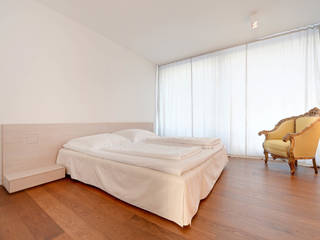 Wohnung K, wesenfeld höfer architekten wesenfeld höfer architekten Camera da letto minimalista