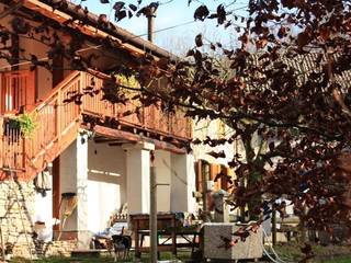 Restauro filologico edificio rustico vincolato a Belluno., Team Replan - Bortoluzzi Associati Team Replan - Bortoluzzi Associati Rustic style houses