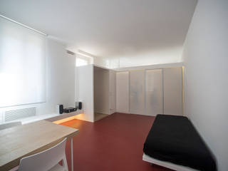 Casa per un fotografo, Silvia Bortolini architetto Silvia Bortolini architetto Minimalist living room