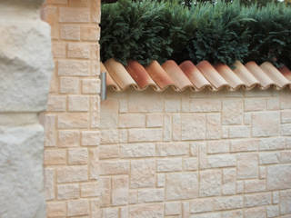 Mediterranes Flair für die Gartenmauer, Rimini Baustoffe GmbH Rimini Baustoffe GmbH حديقة