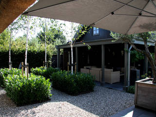 homify Modern terrace